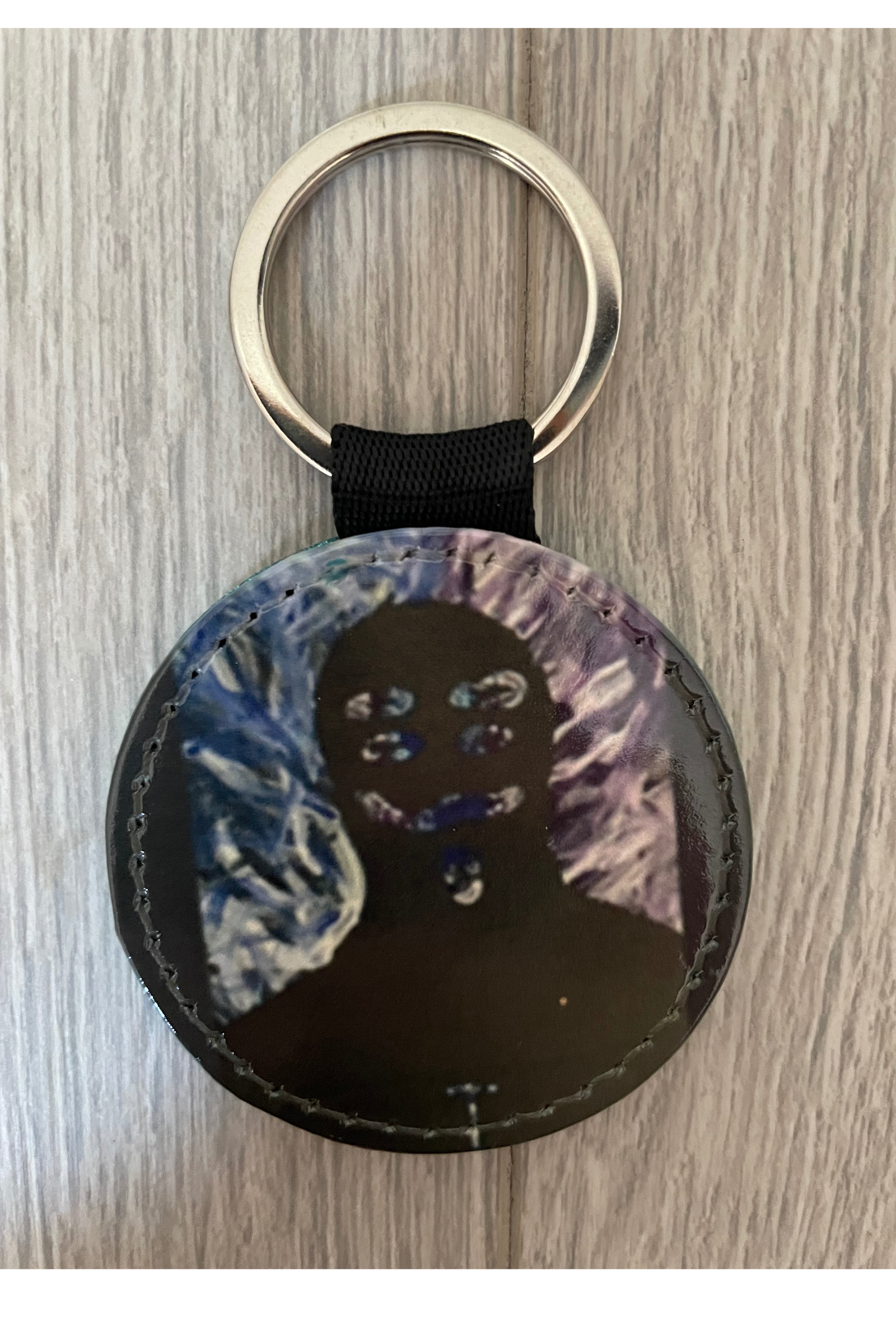 Keyring with gold glitter reverse with a silhouette design- Brier 2022-23