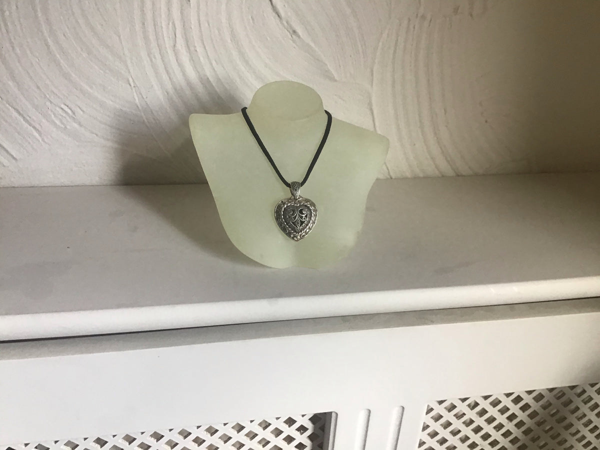 Sterling Silver heart pendant on a black thong