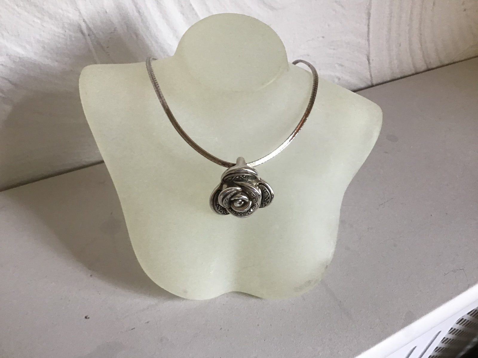Sterling silver small rose pendent on a sterling silver chocker
